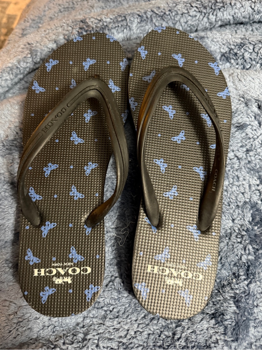 Coach Women’s Black Flip-Flops with Light Blue Butterflies